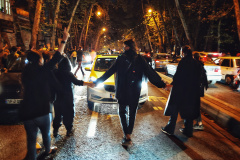 People gather during a protest for Mahsa Amini, who died after being arrested by morality police allegedly not complying with strict dress code in Tehran, Iran on October 1st 2022.Thousands of Iranians have taken to the streets over the last two weeks to protest the death of Mahsa Amini, a 22-year-old woman who had been detained by the morality police in the capital of Tehran for allegedly wearing her mandatory Islamic veil too loosely.