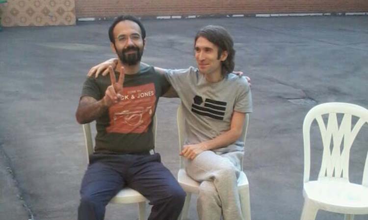 Arash Sadeghi (right) and Soheil Arabi in the courtyard of Evin Prison.