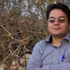 Reformist Journalist Targeted by Intelligence Agents Awaits Sentence After Kafkaesque Trial