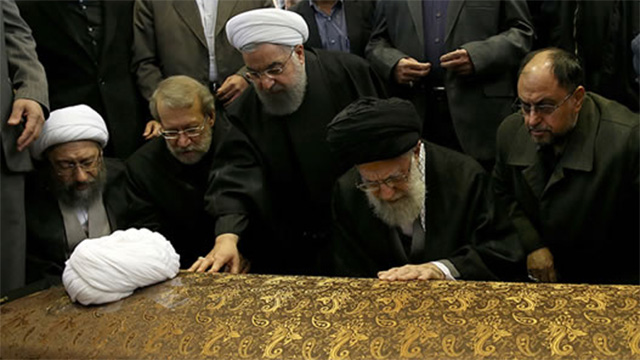 The heads of Iran’s three branches of government and supreme leader pray beside the casket of former President Akbar Hashemi-Rafsanjani on January 10, 2017