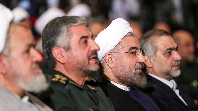 President Hassan Rouhani (right) sitting beside General Mohammad Ali Jafari (left), the commander of the Islamic Revolutionary Guard Corps.