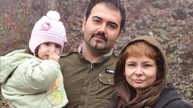 Soheil Arabi with his wife and daughter.