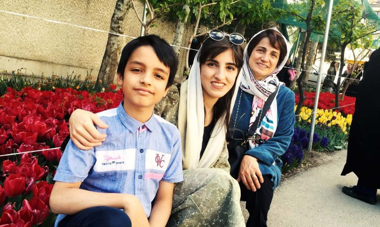 Nasrin Sotoudeh smiles for a picture with her two children, Nima (left) and Mehraveh. The prominent human rights lawyer has been imprisoned in Tehran's Evin Prison since June 2018.